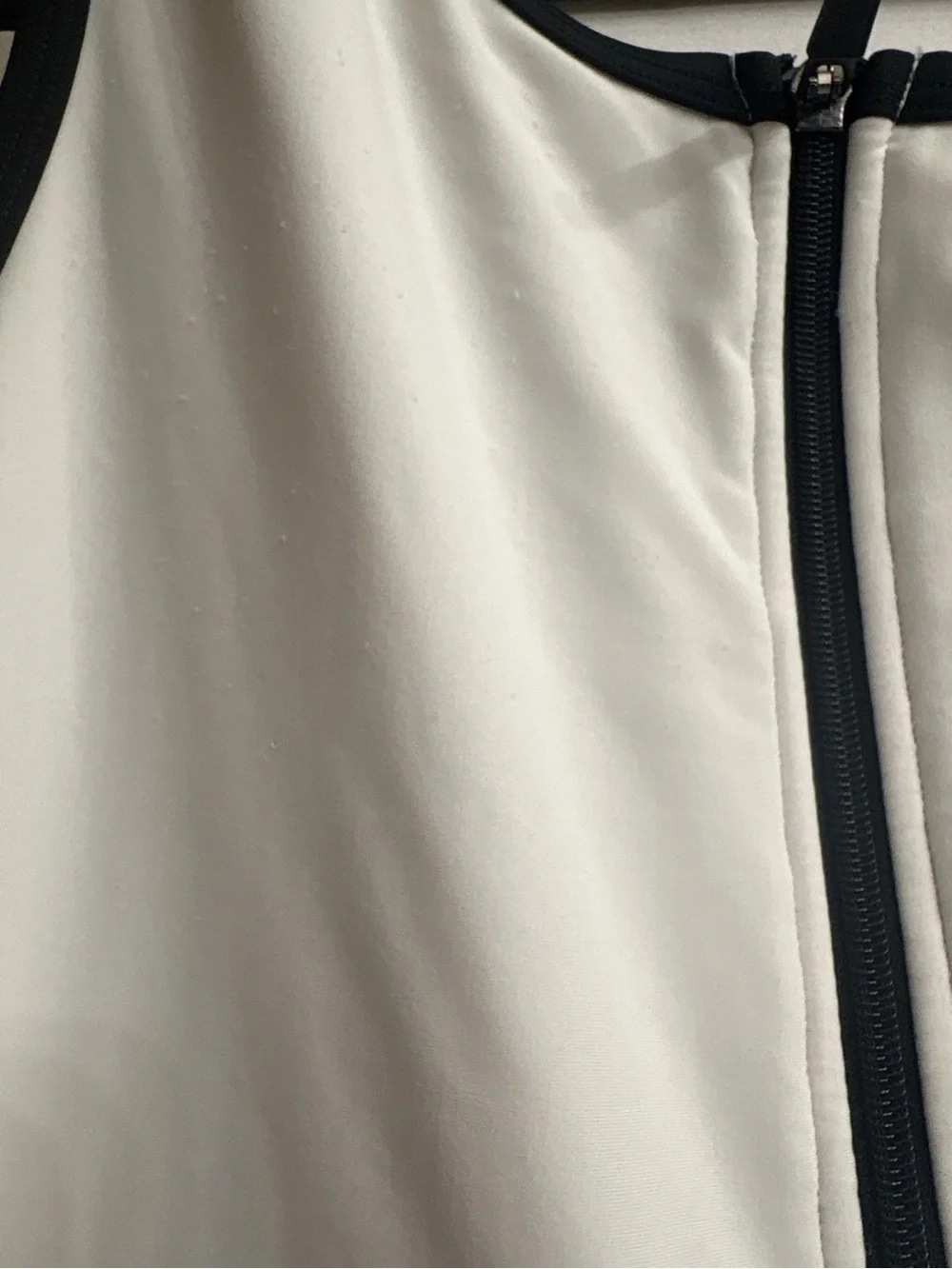 Woman’s White and Black Zip-Front One-Piece Swimsuit